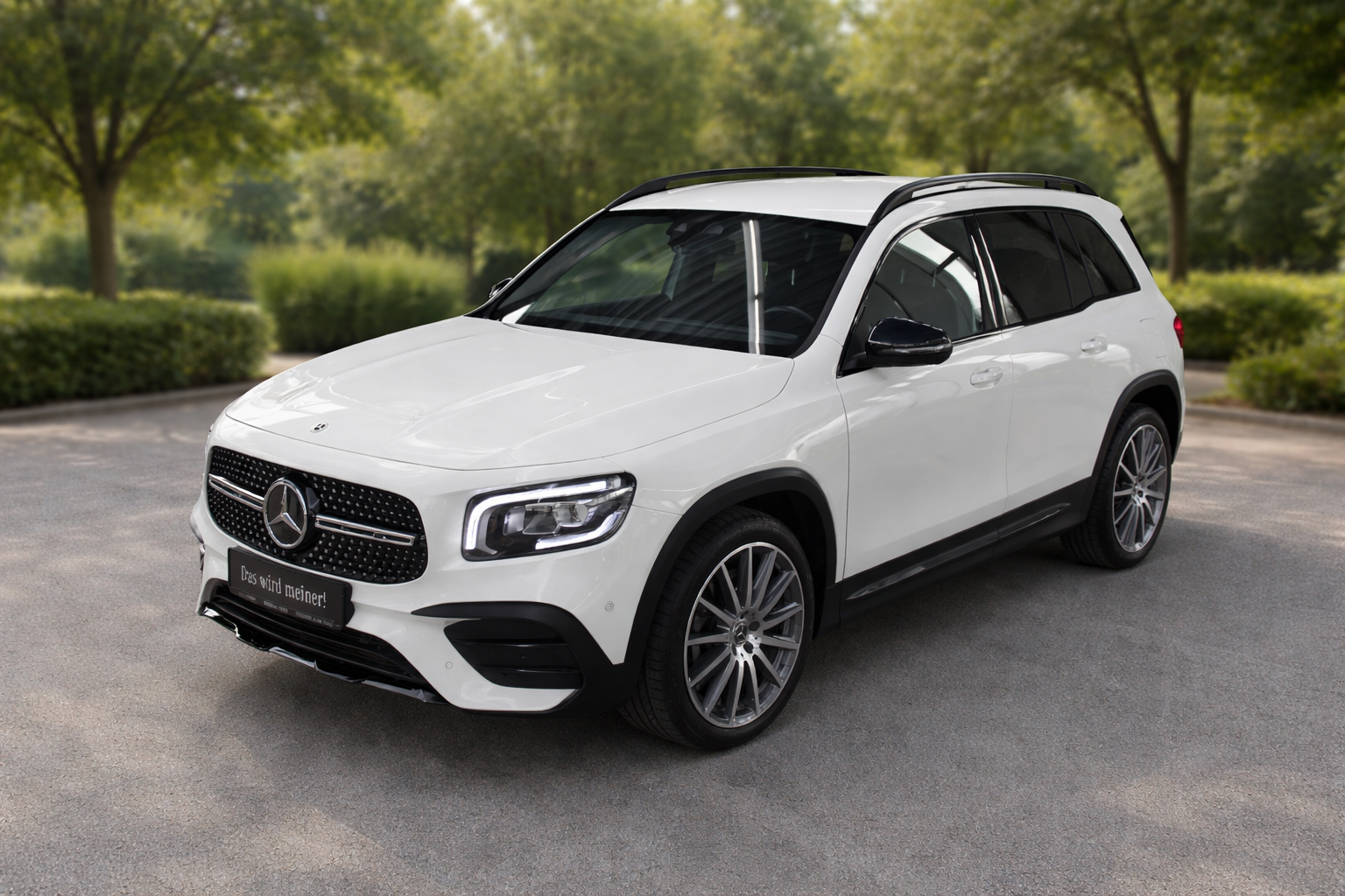 Whitney leaning against a railing on a downtown street